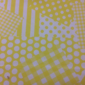 Tissu 100% coton à pois blanc sur fond jaune